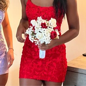 Red detailed homecoming dress size 2. Only worn once in perfect condition.